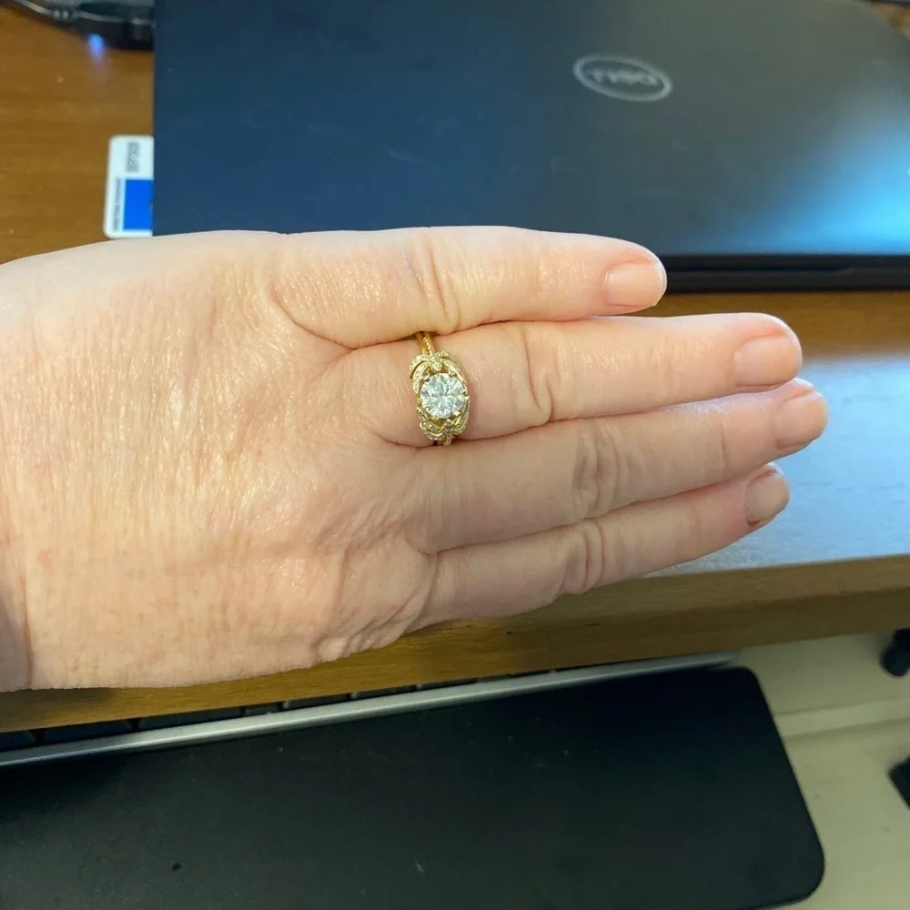 10kt yellow gold and moissanite dragonfly ring.